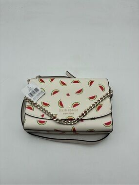 kate spade cream crossbody with watermelon print and gold chain